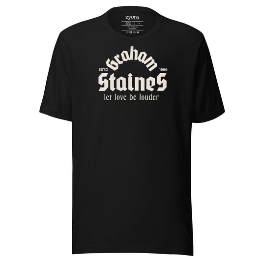 “Graham Staines – Let Love Be Louder” Christian Black  graphic tee, inspired by 1 Corinthians 13:13. Faith-based gift, scripture-inspired apparel for men and women.