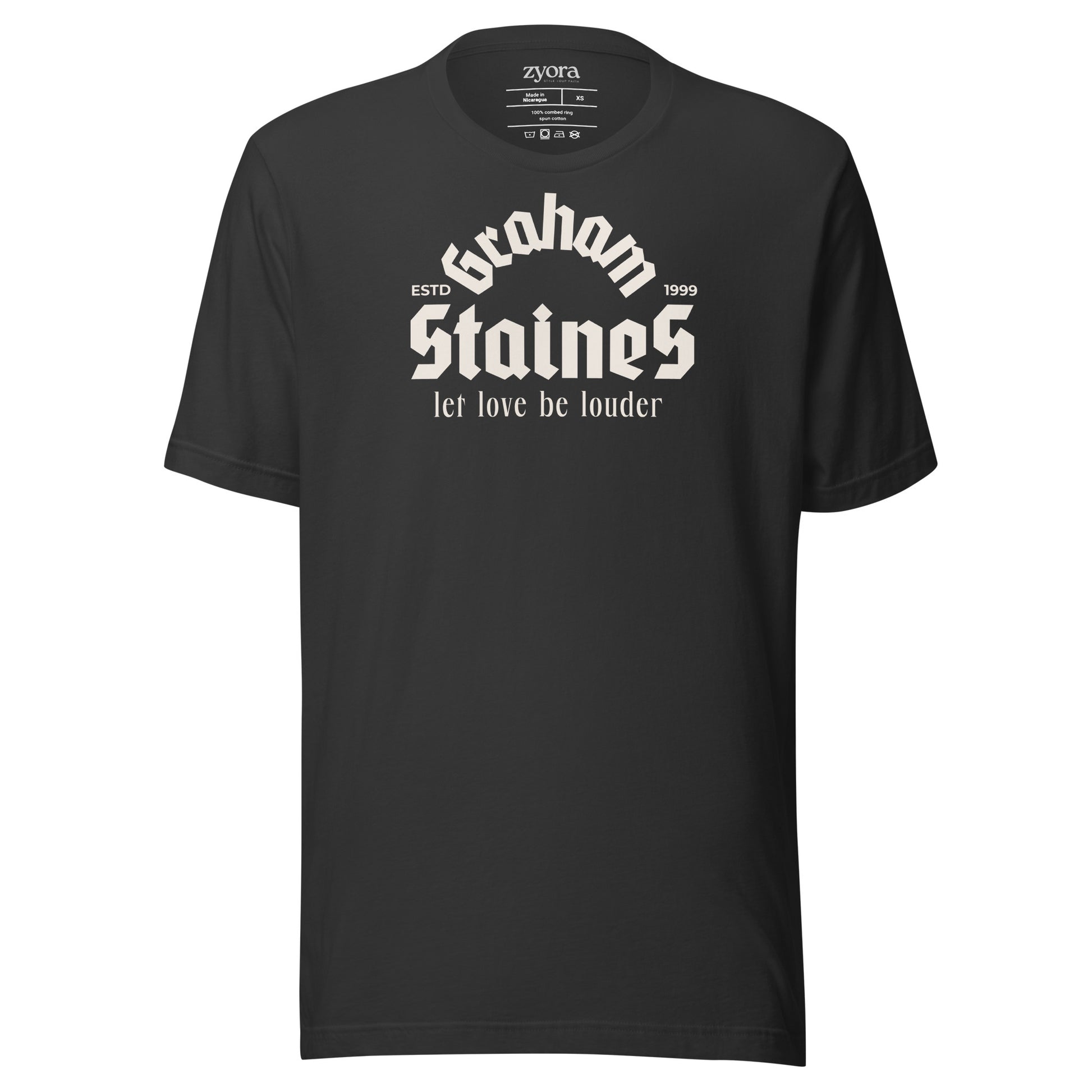 “Graham Staines – Let Love Be Louder” Christian Dark Grey graphic tee, inspired by 1 Corinthians 13:13. Faith-based gift, scripture-inspired apparel for men and women.